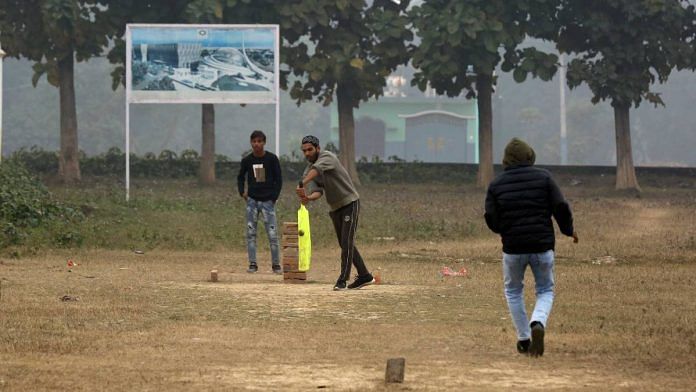 Youngsters play cricket at the site of the proposed mosque in Ayodhya’s Dhannipur | Photo: Suraj Singh Bisht | ThePrint