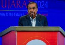 Reliance Industries Chairman and MD Mukesh Ambani addresses the Global leaders on the inaugural day of the Vibrant Gujarat Global Summit 2024, in Gandhinagar on Wednesday | ANI