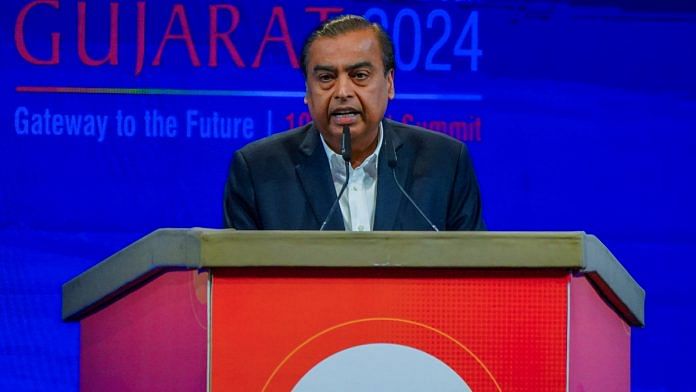 Reliance Industries Chairman and MD Mukesh Ambani addresses the Global leaders on the inaugural day of the Vibrant Gujarat Global Summit 2024, in Gandhinagar on Wednesday | ANI