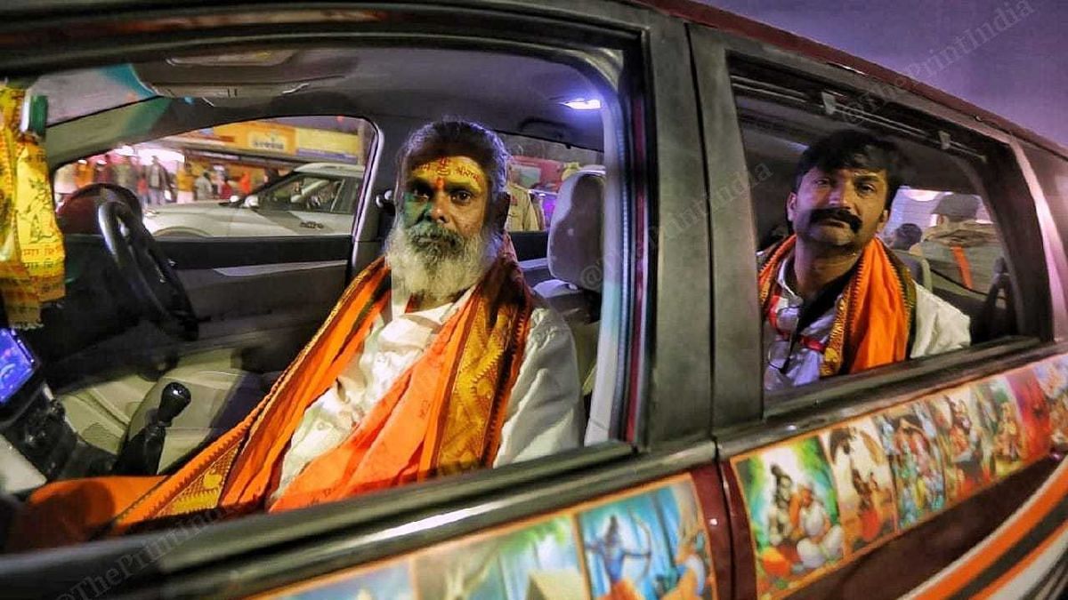 Gopal Krishna and Prabhakar Rao (in the rear seat) at the Lata Mangeshkar Chowk in Ayodhya | Praveen Jain | ThePrint