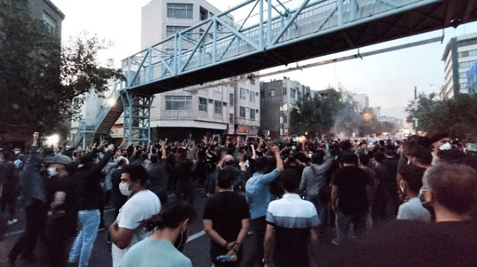 People protest the death of Mahsa Amini in Tehran, Iran | Reuters