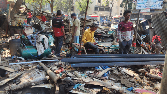 Mohammad Abul Hussain Shaikh and other shop owners at the site of demolition at Haidri Chowk in Mira Road’s Nayanagar | Photo: Purva Chitnis | ThePrint