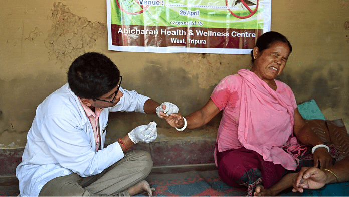 Representational image of a community health officer in Tripura collecting a blood sample from a woman for malaria testing | ANI
