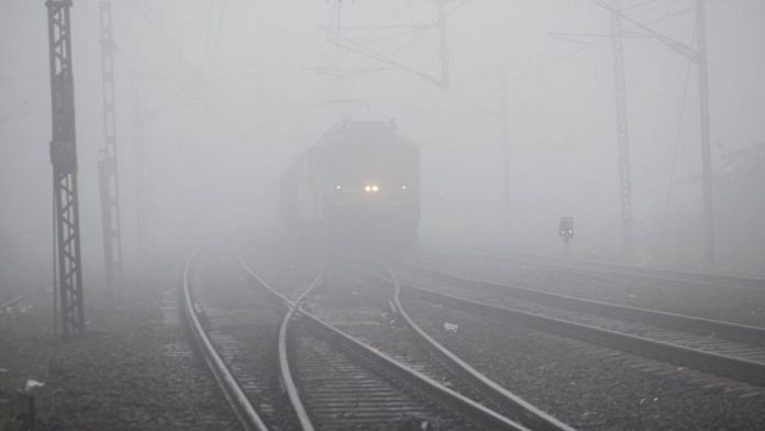 A train runs on the track amid dense fog on a cold winter morning | ANI file photo