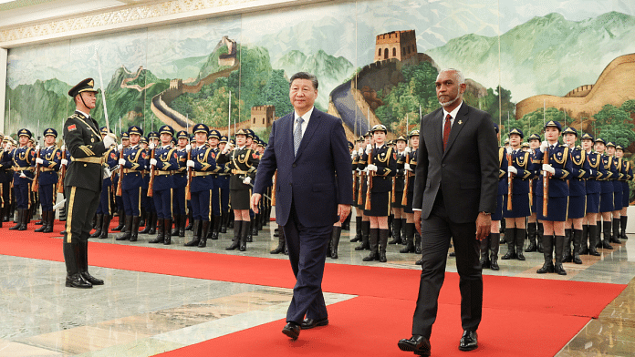 Chinese President Xi Jinping and Maldivian President Mohamed Muizzu attend a welcome ceremony at the Great Hall of the People in Beijing | Reuters File