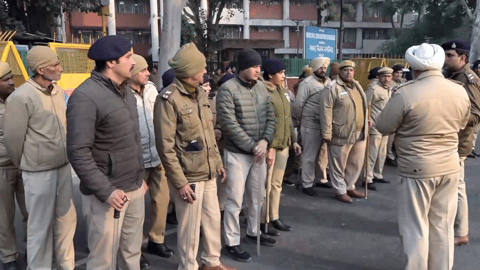 Police personnel stand guard near the office of the municipal corporation in Chandigarh | PTI
