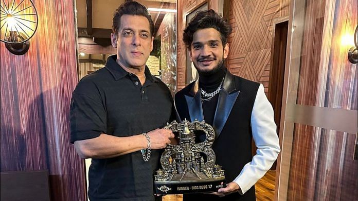 Munawar Faruqui and Salman Khan pose with the Bigg Boss trophy | Instagram @munawar.faruqui