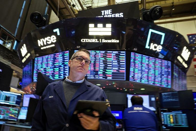 Wall St ends lower, dollar, US yields rise on shifting rate outlook