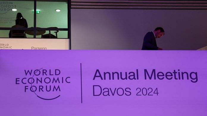 A person walks inside the venue, on the first day of the annual meeting in Davos, Switzerland, January 15, 2024 | Reuters
