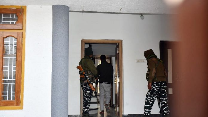 Paramilitary personnel stand guard during searches conducted by ED at the residence of Jharkhand Chief Minister Hemant Soren's press adviser Abhishek Prasad alias Pintu, in Ranchi on Wednesday. | ANI