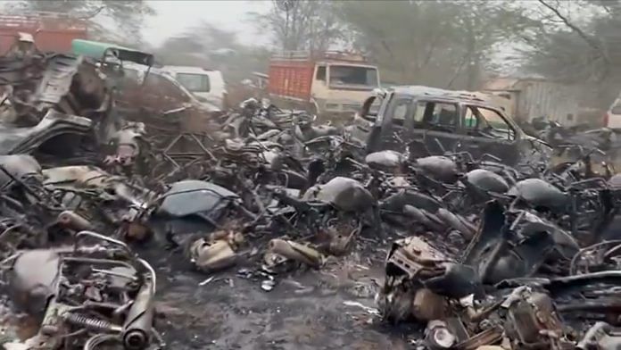 Screengrab from video showing charred vehicles after massive fire at Wazirabad Delhi police yard | X (formerly Twitter) /@ANI