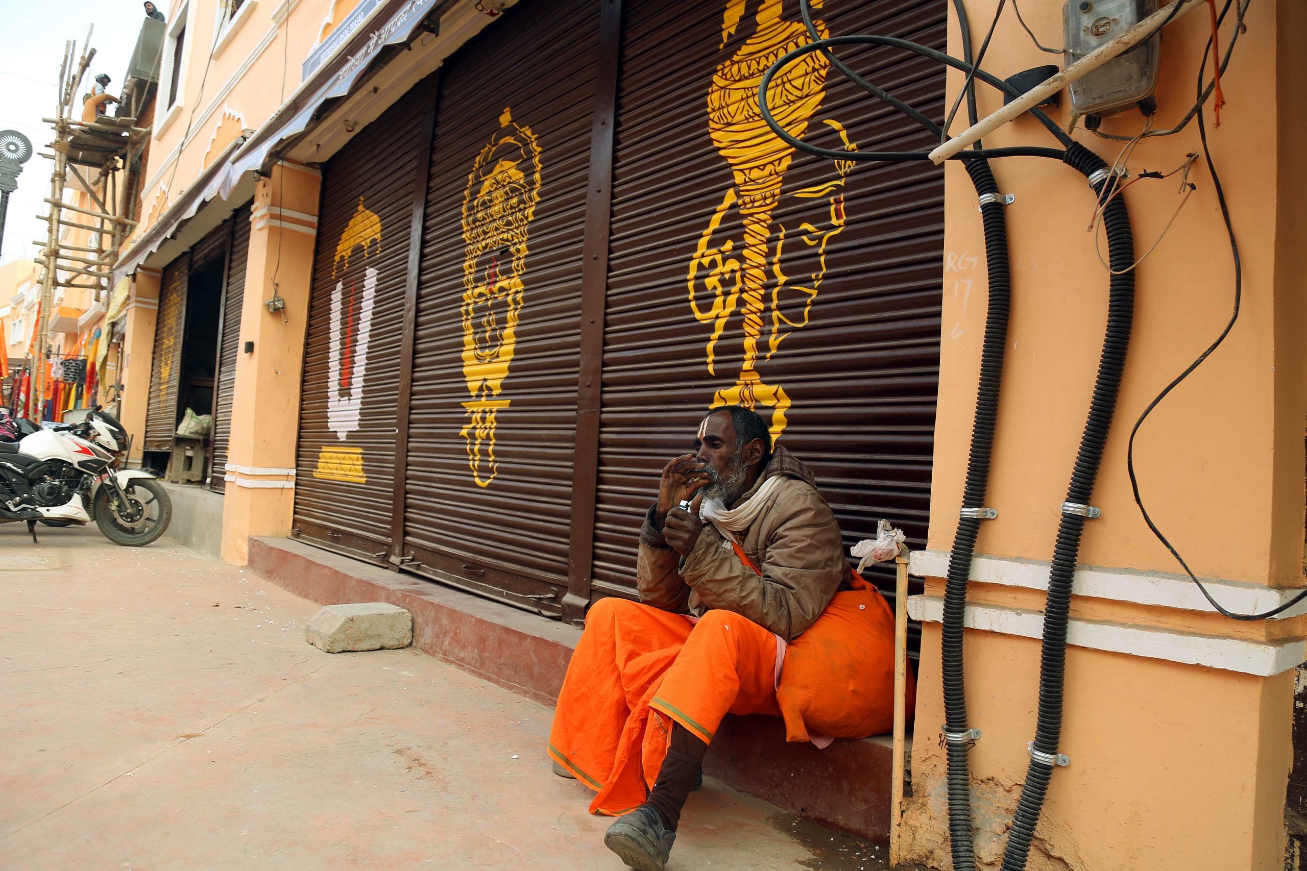 The shutters of stores located in the roads leading up to the Ram Mandir have been painted with Hindu iconography | Suraj Singh Bisht | ThePrint