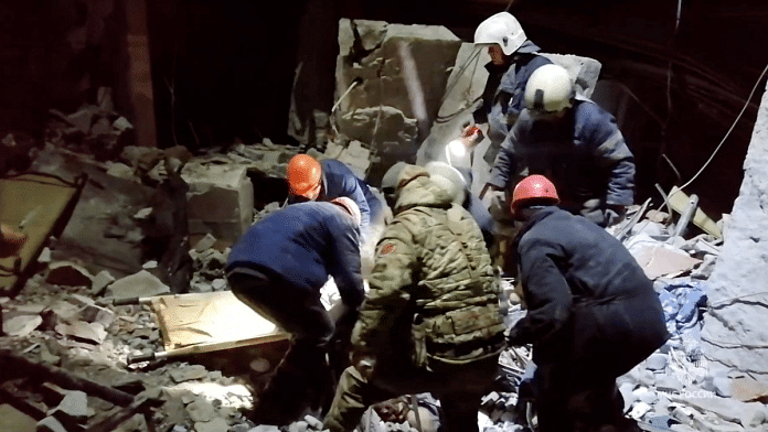 Emergency responders retrieve bodies from the rubble of a devastated building following a Ukrainian attack on the city of Lysychansk, in the occupied eastern Ukrainian region of Luhansk | Reuters