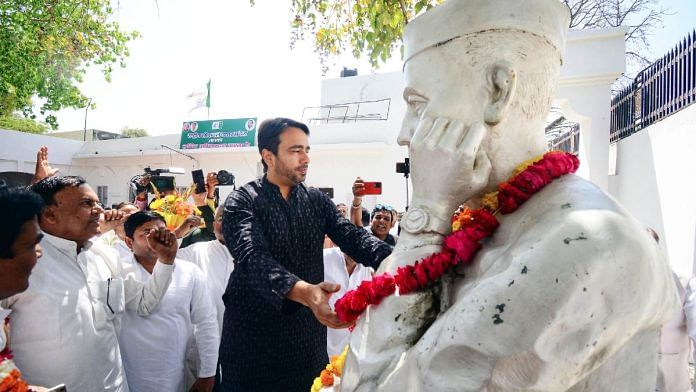 Rashtriya Lok Dal (RLD) chief Jayant Chaudhary offers floral tributes to the statue of former Prime Minister Chaudhary Charan Singh during a meeting with party MLAs, at the party office, in Lucknow, in March 2022 | ANI