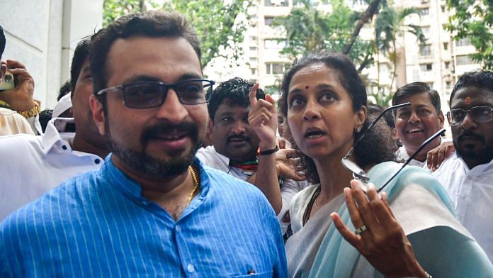 File image of NCP MP Amol Ramsing Kolhe with fellow party parliamentarian Supriya Sule | ANI