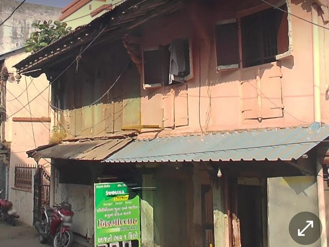 The side of the house painted in green belonged to Hawaben Baliya, from where the gold coins were found. | Photo by special arrangement