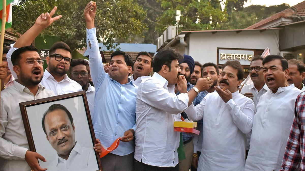 Nationalist Congress Party (NCP) workers celebrate following the Maharashtra Assembly Speaker's decision that the 'Ajit Pawar faction is the real NCP', outside the party office, in Mumbai on Thursday | ANI 