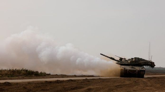 An Israeli tank returns from the southern Gaza strip, in southern Israel, February 26, 2024. REUTERS/Amir Cohen