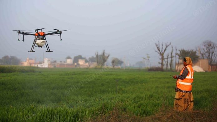 A 'Drone Didi' practicing in the open field | Manisha Mondal | ThePrint