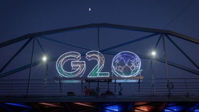 G20 logo installed on a pedestrian bridge in front of the main venue of the summit in New Delhi, India, August 25, 2023. REUTERS/Adnan Abidi/File Photo