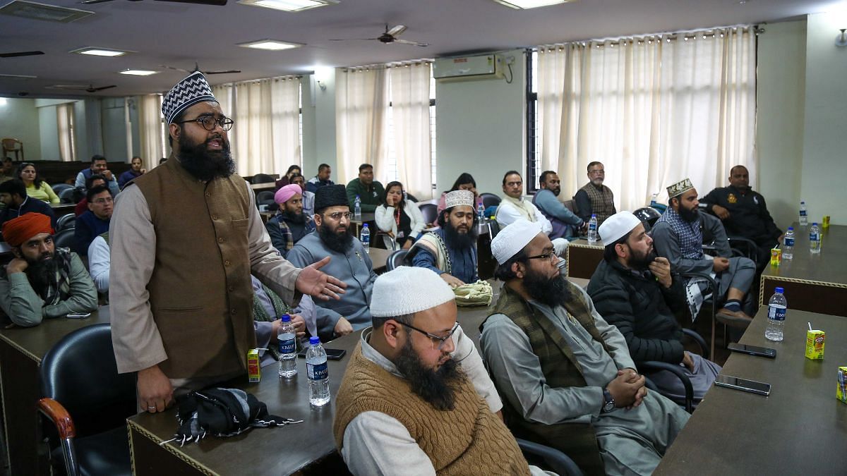 Representatives from Haldwani's Muslim community speak to DM Vandana Singh & Nainital SSP Prahlad Narayan Meena | Photo by Suraj Singh Bisht, ThePrint