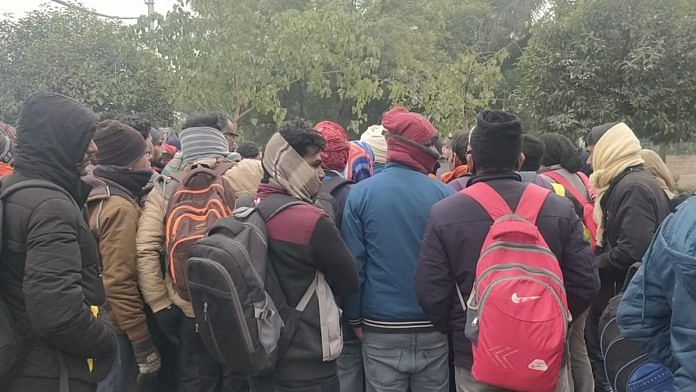 Workers gathered outside Maharshi Dayanand University in Rohtak in January 2024 | Photo: Vandana Menon, ThePrint