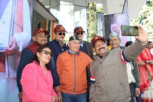 BJP workers gathered at the IRTD Auditorium on 8 February in Dehradun to thank Dhami following the passage of the UCC bill | Photo: Heena Fatima | ThePrint