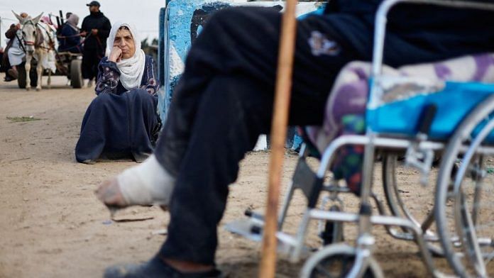 Palestinian patients rest as they arrive in Rafah after they were evacuated from Nasser hospital in Khan Younis due to the Israeli ground operation, amid the ongoing conflict between Israel and Hamas, in the southern Gaza Strip, February 15, 2024. REUTERS/Mohammed Salem/file photo