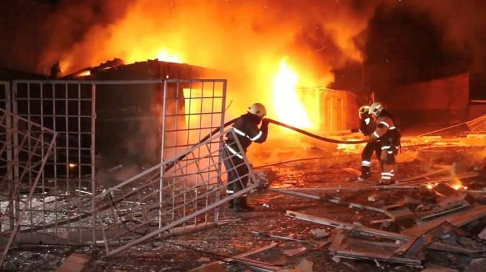 Emergency personnel work to put out a fire following a drone attack, amid Russia's attack on Ukraine, in Kharkiv, Ukraine in this screengrab obtained from a video released on January 31, 2024 | Reuters