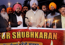 Congress MP Gurjeet Singh Aujla (3-R-in violet turban) along with members of various NGOs and social workers take part in a candlelight vigil for Shubhkaran Singh, a farmer who died at Khanauri border during the ongoing farmers' protest, in Amritsar | ANI