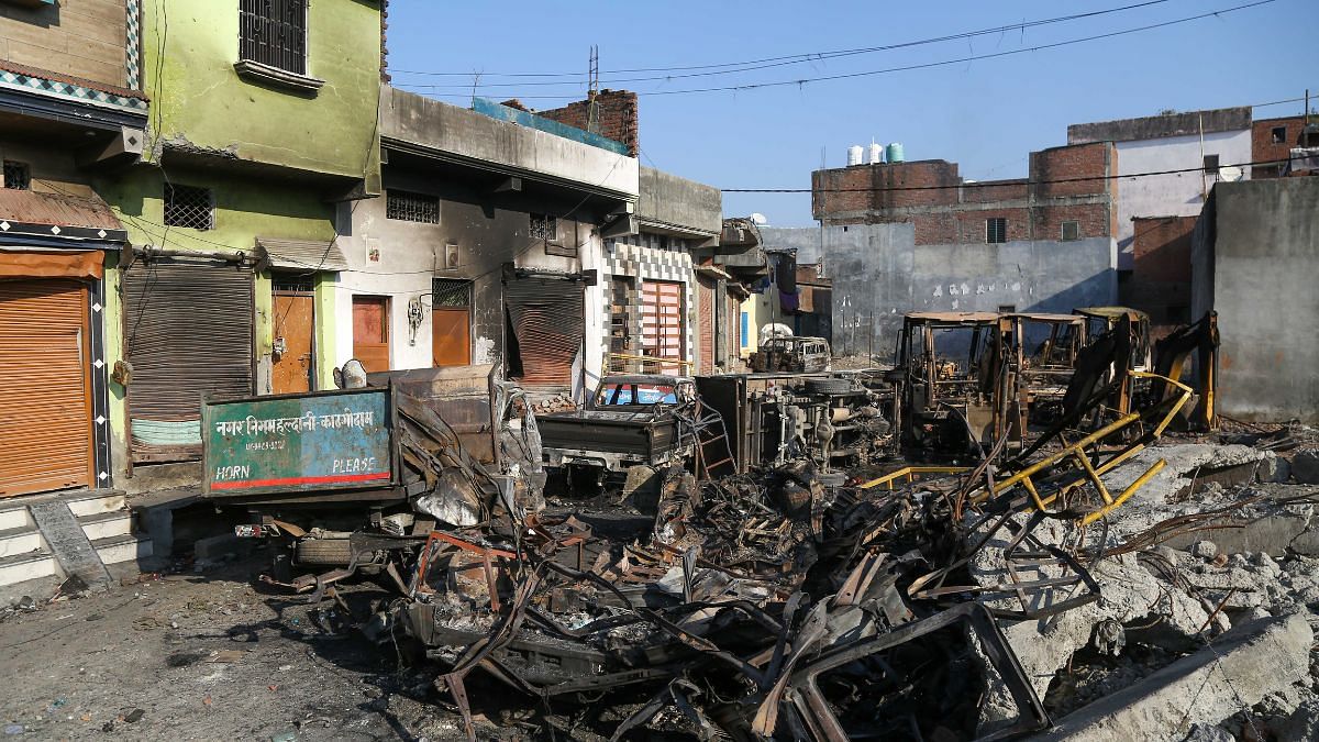 Torched vehicles at Malik ka Bagicha in Haldwani Banbhoolpura area | Suraj Singh Bisht | ThePrint