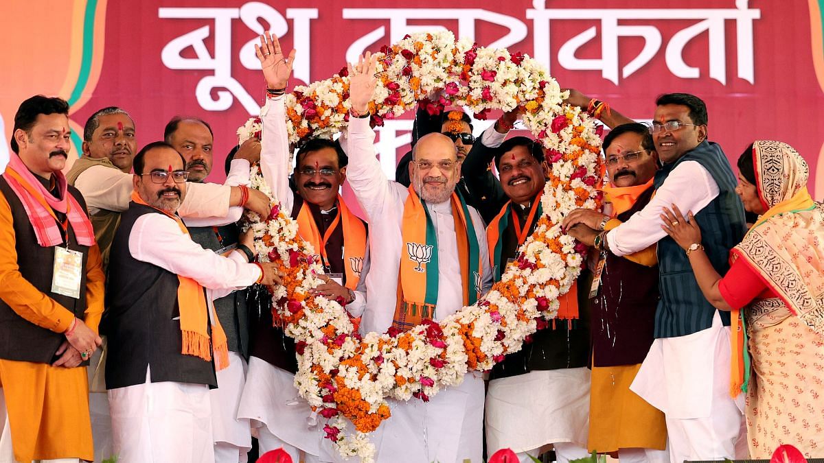 Union Home Minister Amit Shah being garlanded during the BJP workers conference in Khajuraho on Sunday | ANI 
