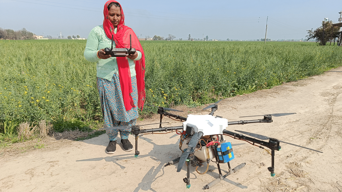 At Karnal's Katlaheri village, Sita Devi readies her drone for the day's work | Falguni Sharma | ThePrint