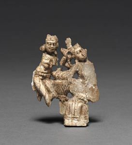 Ladies at Toilette, Kushan, Begram, Afghanistan, 50–200 CE, Ivory, 7.2 x 5.3 cm, Image courtesy of the Cleveland Museum of Art