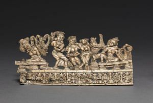 Ladies entertained by dancers, Kushan, Begram, Afghanistan, 1–200 CE, Ivory, 7.5 x 17 cm, Image courtesy of the Cleveland Museum of Art