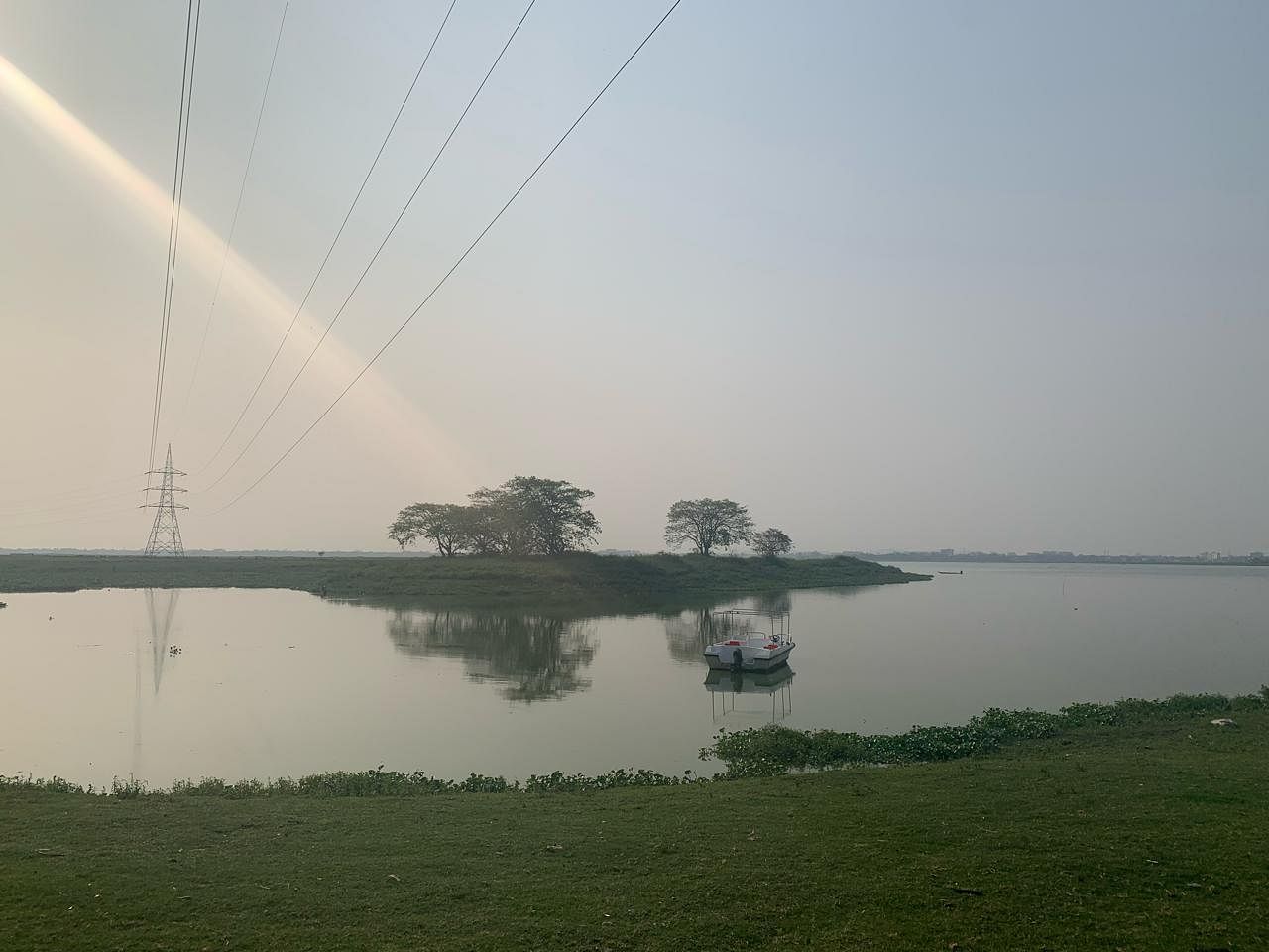 A view of a boat on the beel | Karishma Hasnat | ThePrint