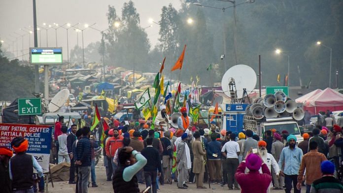 Farmers with their tractors and trolleys parked on a highway during the ongoing farmers� protest over various demands, including a legal guarantee of minimum support price (MSP) for crops, at the Punjab-Haryana Shambhu Border, in Patiala district, Sunday, Feb. 18, 2024 | PTI