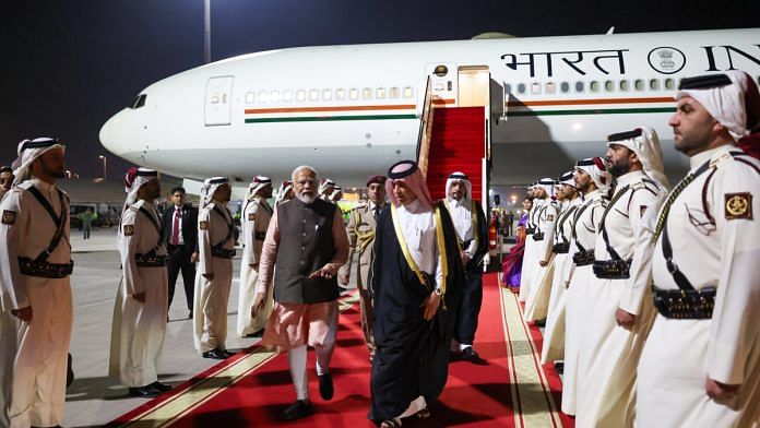 Prime Minister Narendra Modi being received by State Minister for Foreign Affairs of Qatar, Soltan bin Saad Al-Muraikhi as he arrives at the airport, in Doha, Qatar, Wednesday, Feb. 14, 2024 | PTI