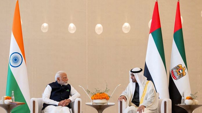 Sheikh Mohamed bin Zayed Al Nahyan, President of the United Arab Emirates, meets with Narendra Modi, Prime Minister of India, during a reception at the Presidential Airport in Abu Dhabi, United Arab Emirates, February 13, 2024 | Handout via Reuters
