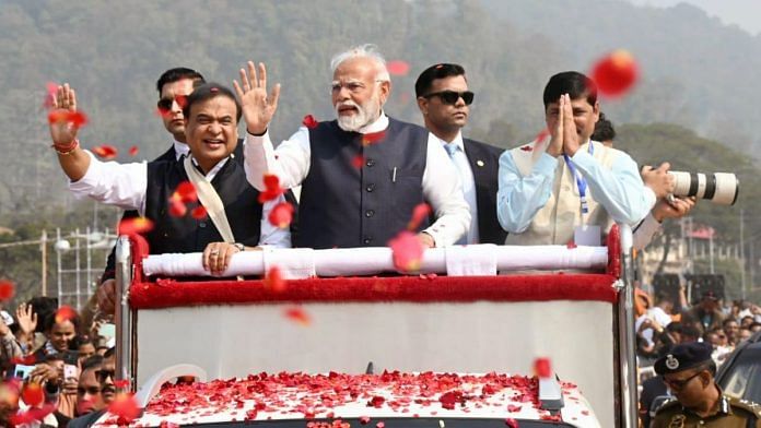 Prime Minister Narendra Modi waves to the crowd in Guwahati, Assam, on 4 February | Photo: ANI