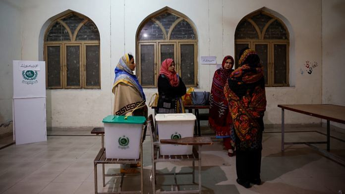 Staff are briefed inside a polling station on the day of the general election, in Lahore, Pakistan February 8, 2024 | Reuters