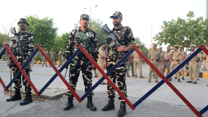 Security personnel deployed outside the Rani Durga Medical College (Hospital) following the death of the Mukhtar Ansari, in Banda, March 29, 2024 | PTI