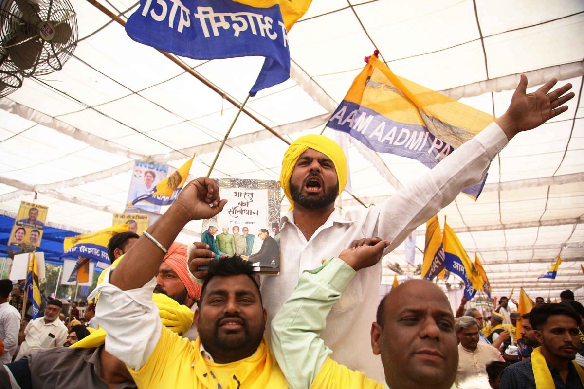 A man shouts slogans while carrying constitution at the rally | Photo: Manisha Mondal | ThePrint