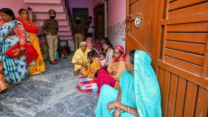 Locals and relatives at Vinod Kumar's home in Budaun, Wednesday | Manisha Mondal | ThePrint