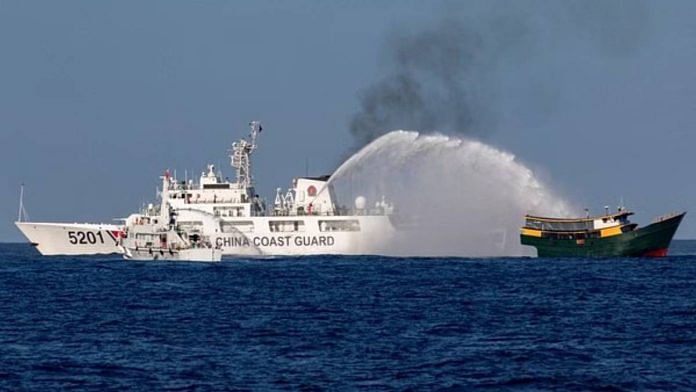 Chinese Coast Guard vessels fire water cannons towards a Philippine resupply vessel Unaizah May 4 on its way to a resupply mission at Second Thomas Shoal in the South China Sea | Photo: Reuters