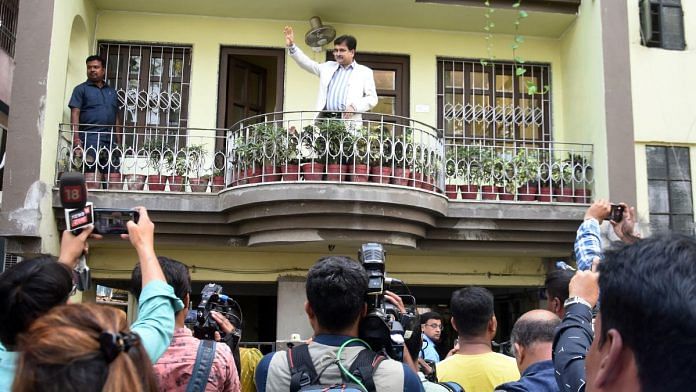 Justice Abhijit Gangopadhyay waves to media persons at his residence after he announced he will join the BJP following his resignation, 5 March | Photo: ANI