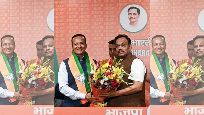 Industrialist and former Congress MP Naveen Jindal being welcomed into the BJP partyfold in presence of party General Secretary Vinod Tawde, in New Delhi on Sunday | ANI