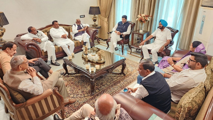 JJP president Dushyant Chautala holding his party's coordination committee meeting at Sirsa in Haryana | Pic credit: X/@Dchautala