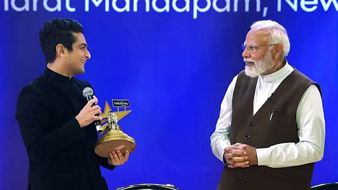 PM Modi presents Ranveer Allahbadia aka BeerBiceps with the Disruptor of the Year Award at the National Creators Award | ANI