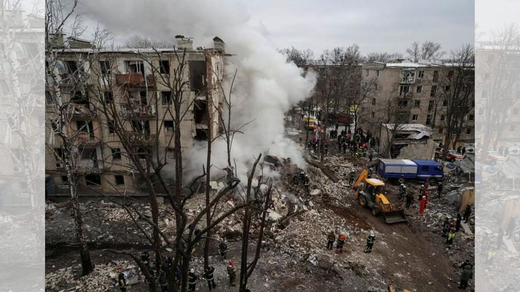 Rescuers work at a site of a residential building heavily damaged during a Russian missile | File photo | Sofiia Gatilova/Reuters